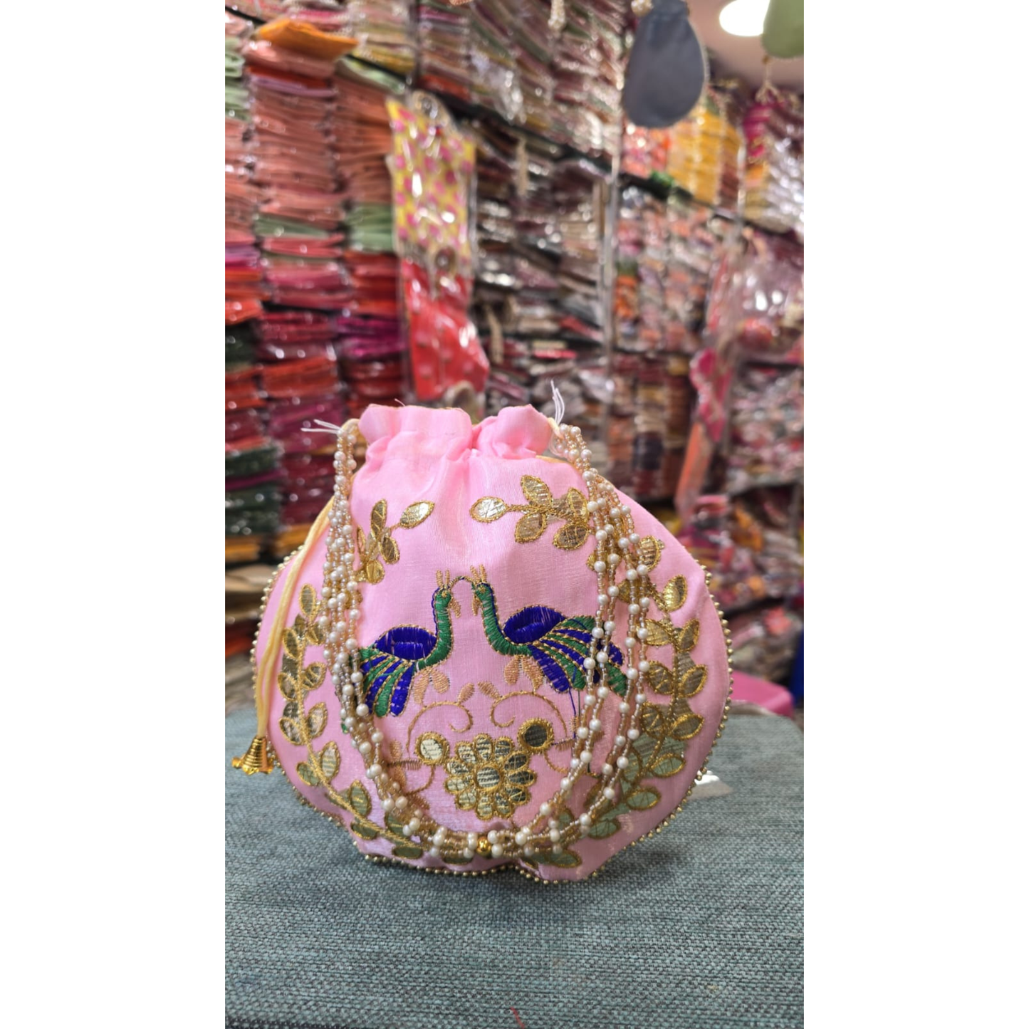 Handcrafted Pink Peacock Embroidered Potli Bag with Pearl Handle